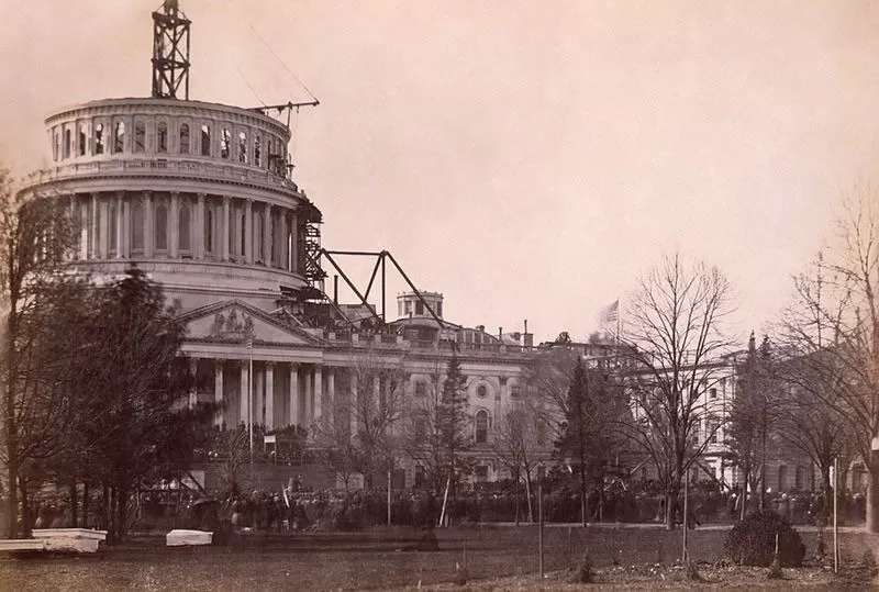 Lincoln's Inauguration, March 1861, with the U.S. Capitol Dome under construction in background.