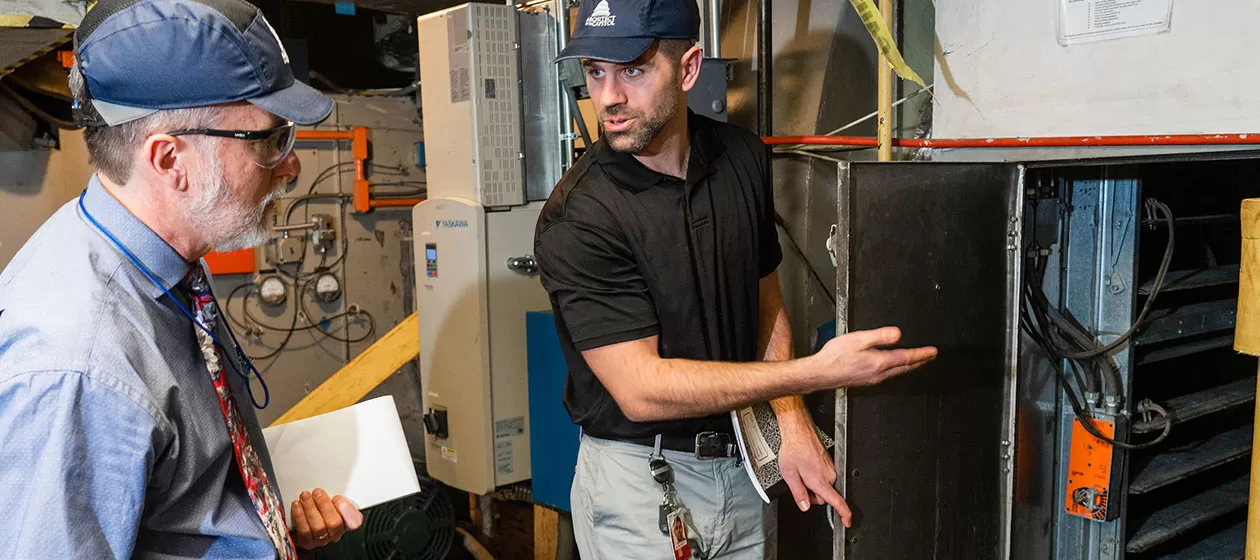 AOC employees discussing permit requirements during a self-inspection at the U.S. Capitol.