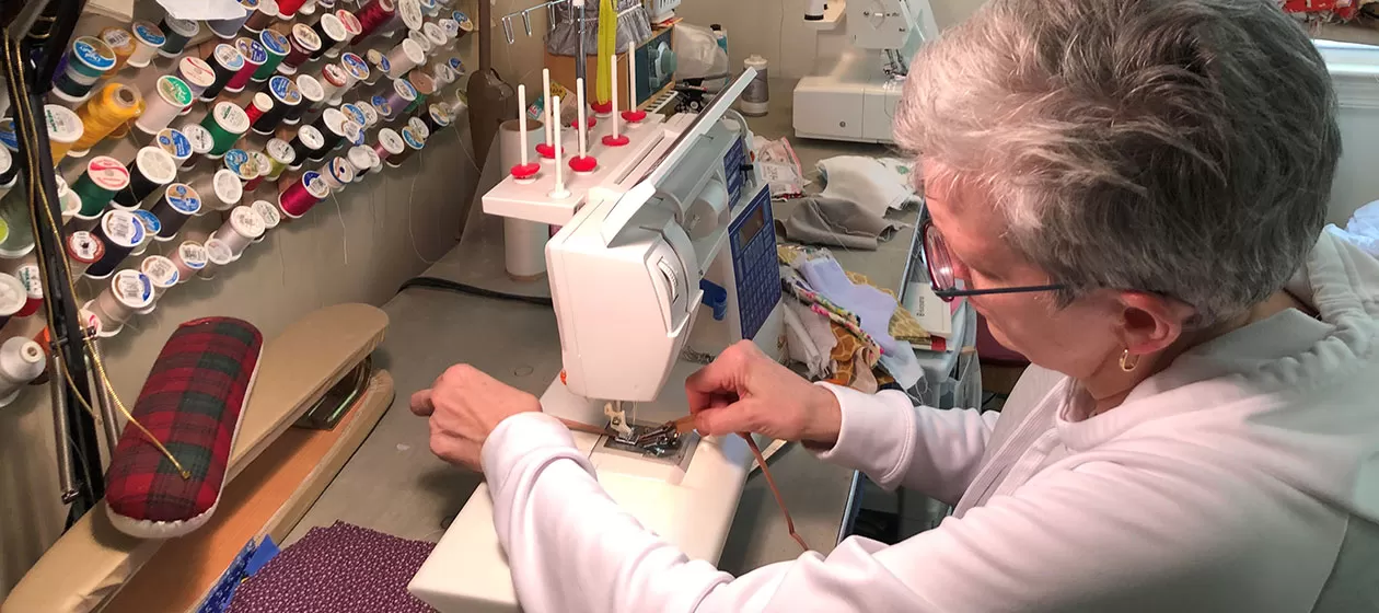 CVC employee sewing face masks during the novel coronavirus.