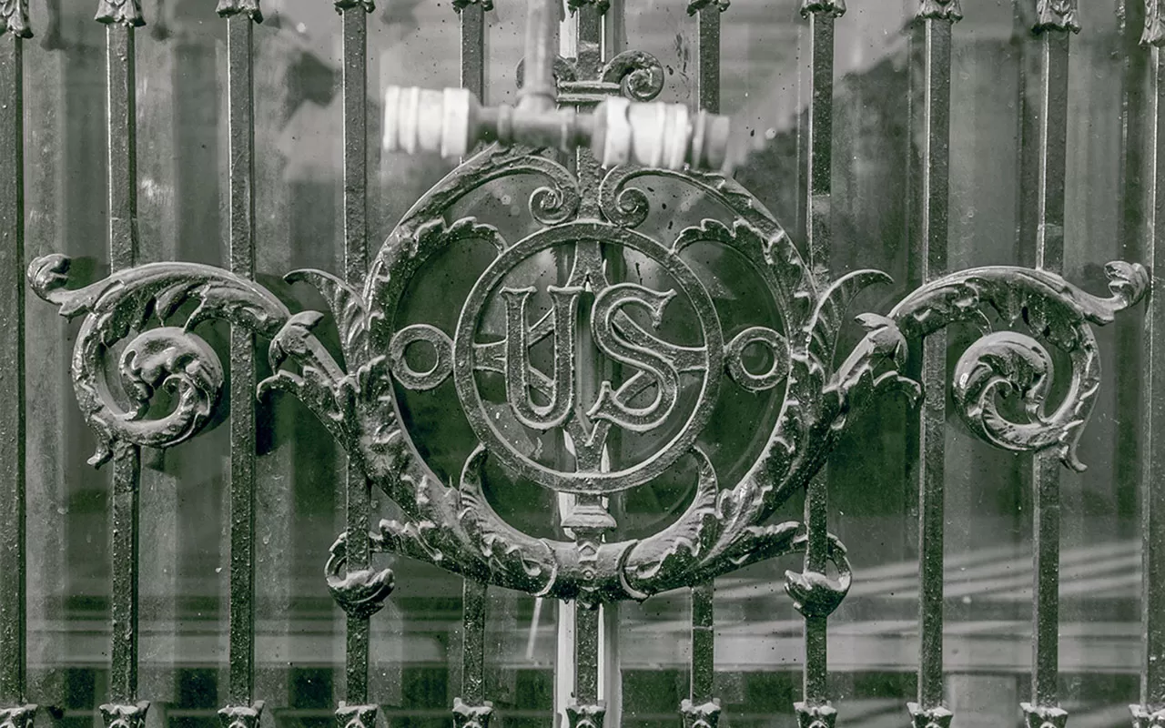 Detail of grill work above exterior doors at the U.S. Capitol's south House carriage entrance.
