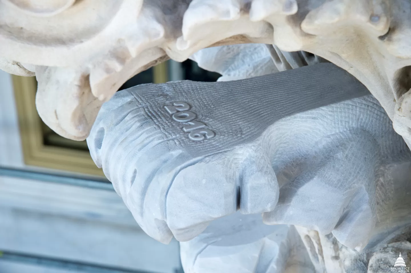 2016 carved into a column capital during the Capitol Exterior Preservation project's stone work.