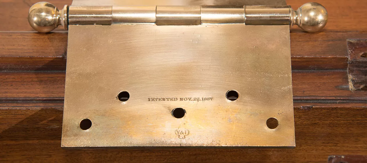 Close look at a door hinge in the Library of Congress Thomas Jefferson Building, patented Nov. 22, 1887.