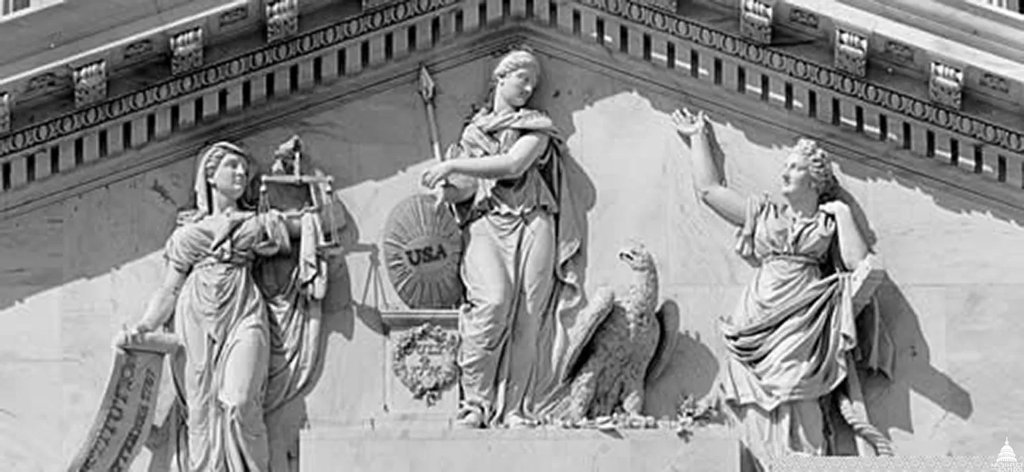 Sculpture of three people.