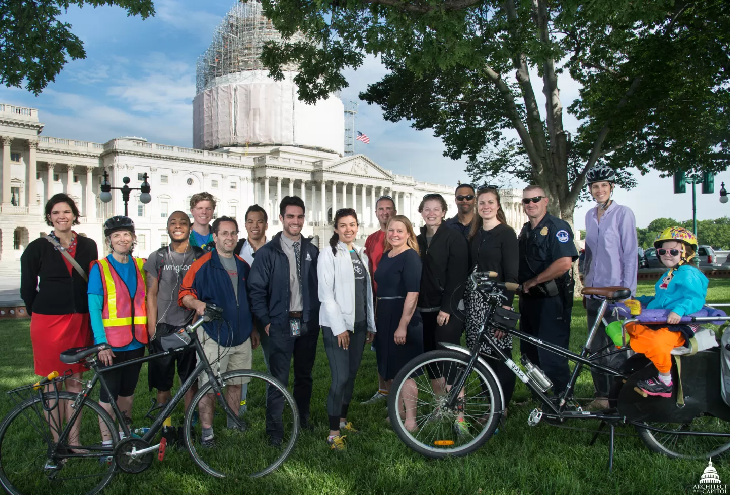 Group of people standing in front of the U.S. Capitol.