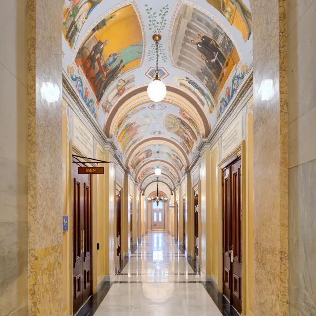 View down a hallway of the Cox Corridors in the House wing of the U.S. Capitol.