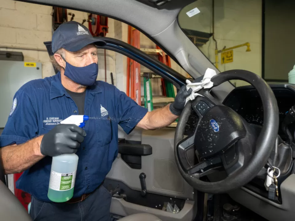 Richard Caselman completes the COVID-19 cleaning protocols for AOC vehicles.