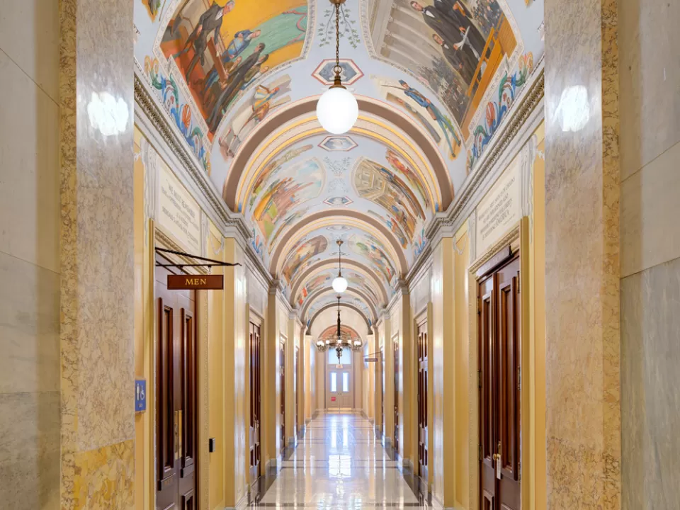 View down a hallway of the Cox Corridors in the House wing of the U.S. Capitol.