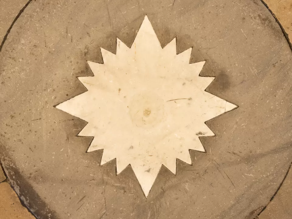 View of the star in the center of the Crypt floor.