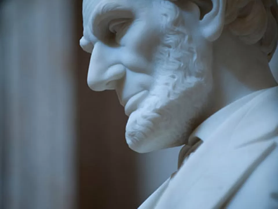 Profile view of Lincoln's statue in the U.S. Capitol Rotunda.