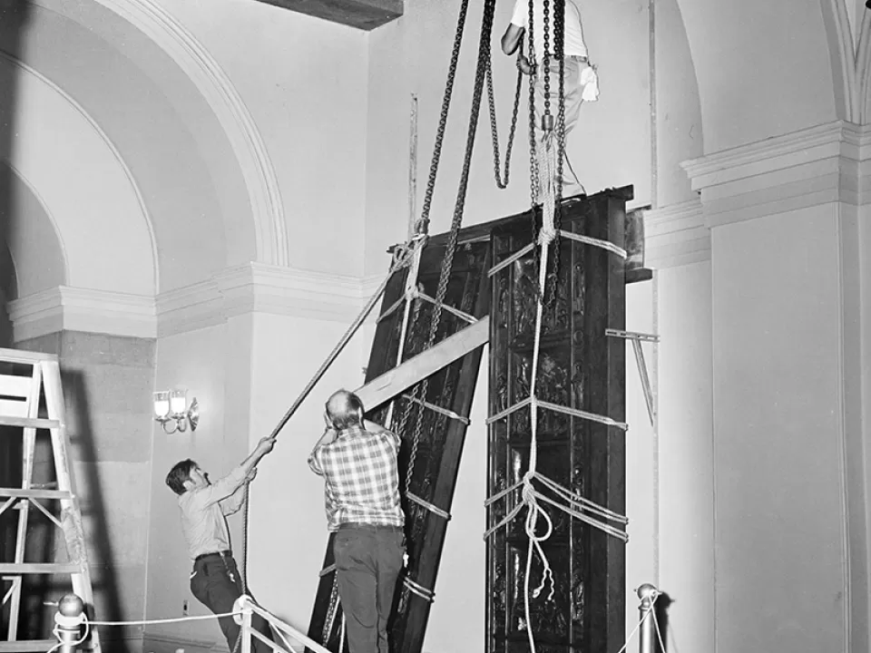 AOC employees, seen here in 1972, installing the Amateis Doors in the U.S. Capitol.