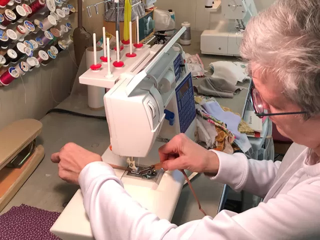 CVC employee sewing face masks during the novel coronavirus.