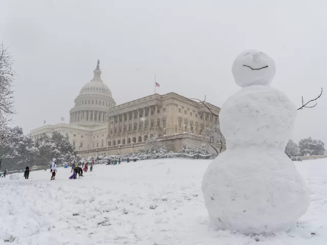 A snowman smiles on the West Front Lawn of the U.S. Capitol in Washington, D.C.