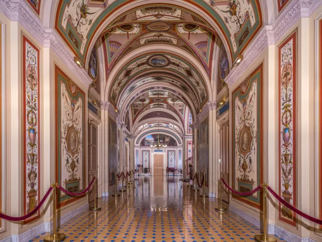 View down one hall of the Brumidi Corridors in the U.S. Capitol.