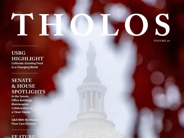 Cover image for Volume 24 of Tholos magazine. Red leaves frame the U.S. Capitol dome and Statue of Freedom.