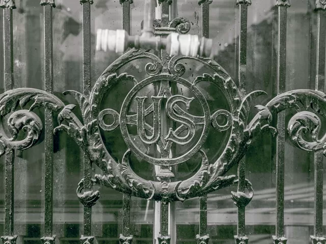 Detail of grill work above exterior doors at the U.S. Capitol's south House carriage entrance.