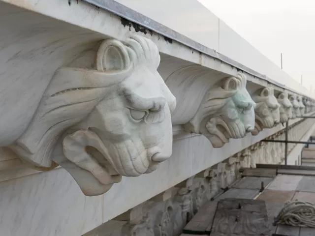 Close-up photo of lion detail at the Supreme Court Building.