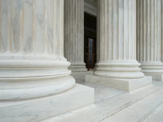 A portico of tall Corinthian columns gives the Supreme Court Building a monumental entrance.