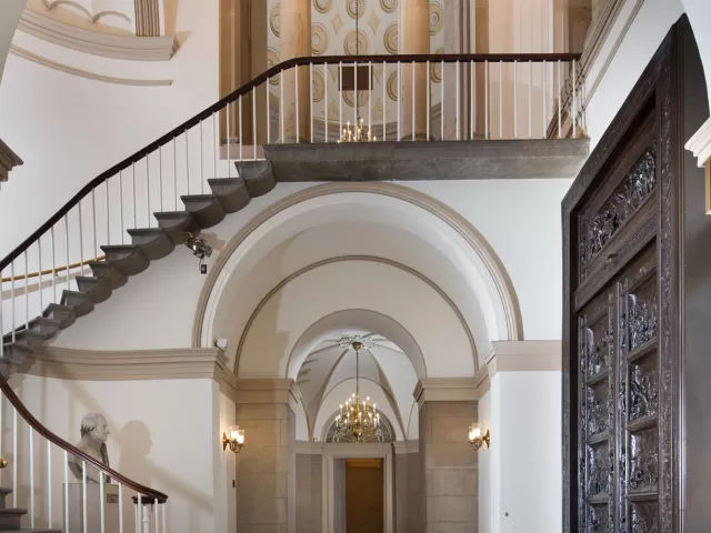 The bronze Amateis Doors are on display in the House Wing of the U.S. Capitol, across from the Bulfinch stairway near the Memorial Door entrance. 