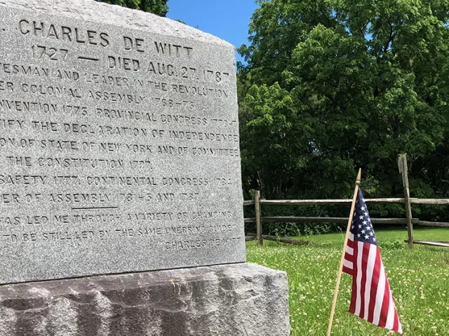 The tombstone of Colonel Charles De Witt. Born 1727 - Died Aug. 27, 1787. Patriot, statesman and leader in the revolution. Voting to ratify the Declaration of Independence.