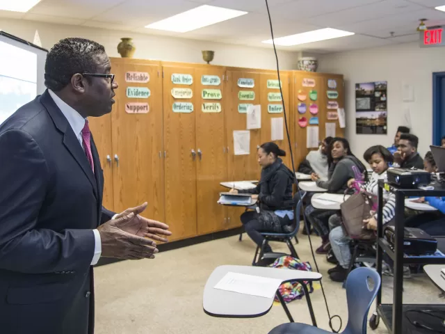 AOC architect Eugene Poole teaches a class on "The Five Orders of Architecture" to students at Phelps High School.