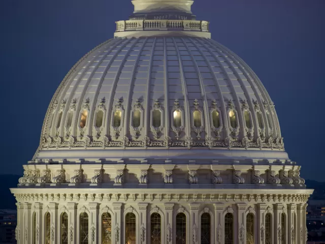 The U.S. Capitol Dome's cupola at night.