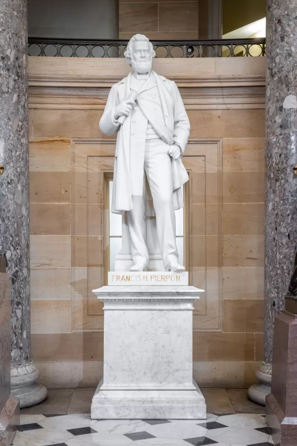 Marble statue of a person standing.