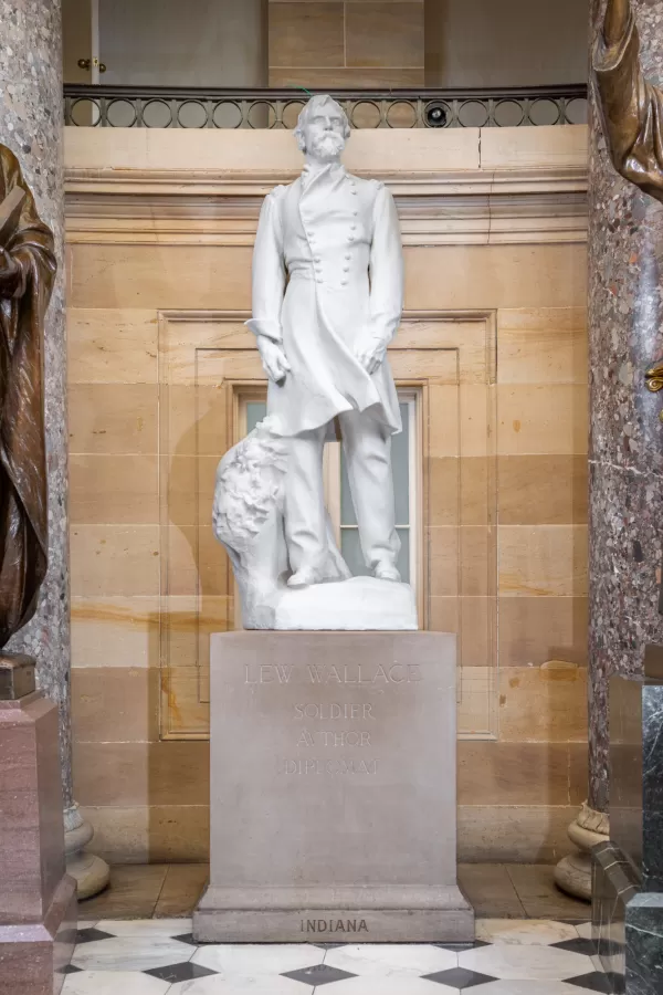 Marble statue of a person standing.